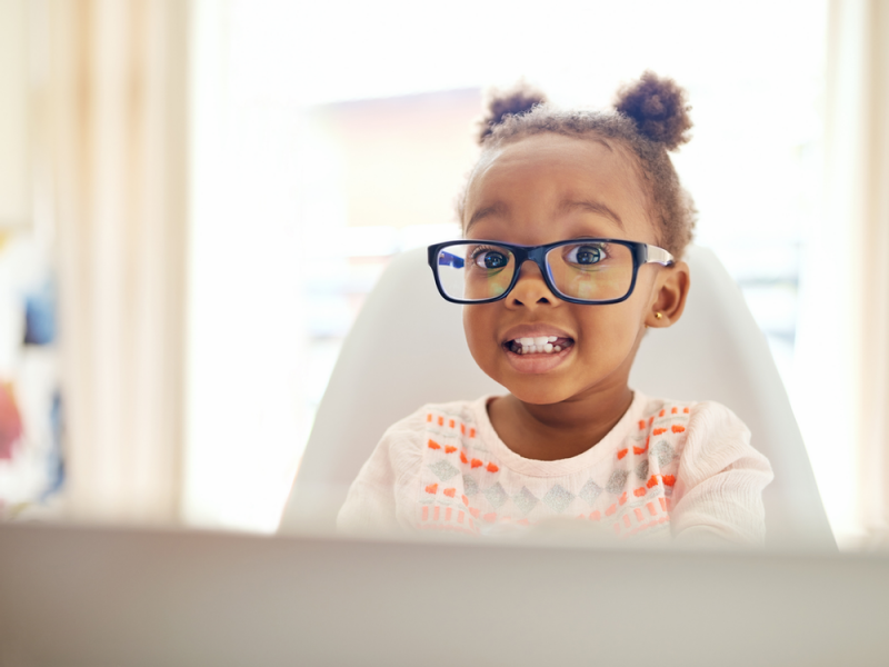 Young child in front of computer
